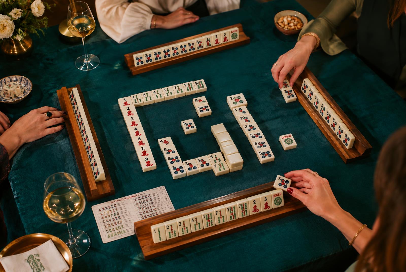 A private mahjong party table set with wine